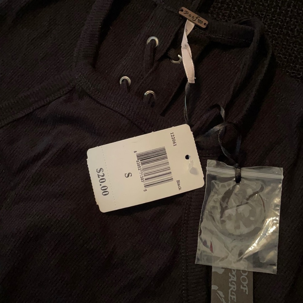 Black tie back tank top. Size small. NWT.